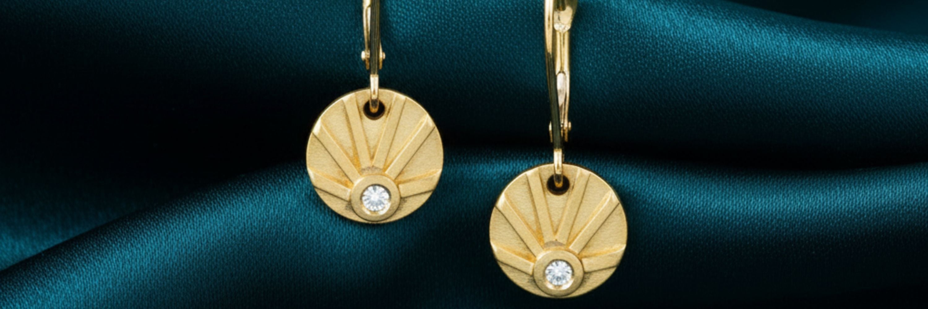 14K gold sun earrings by Jen Lesea