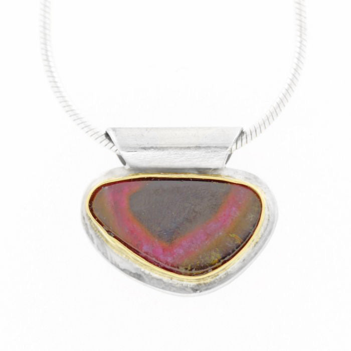 Necklace with a colorful pendant on a white background