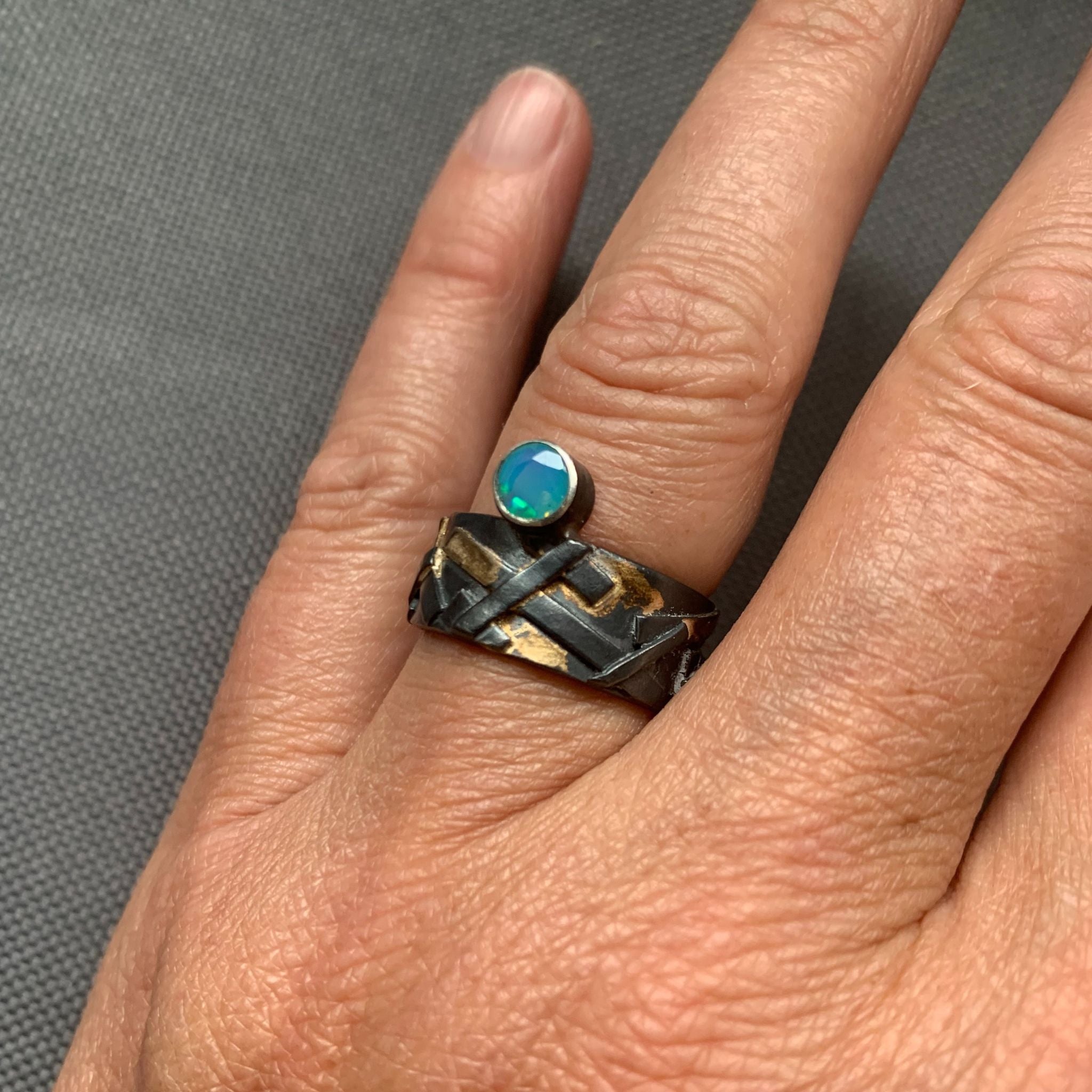 Blue Ethiopian opal ring on model