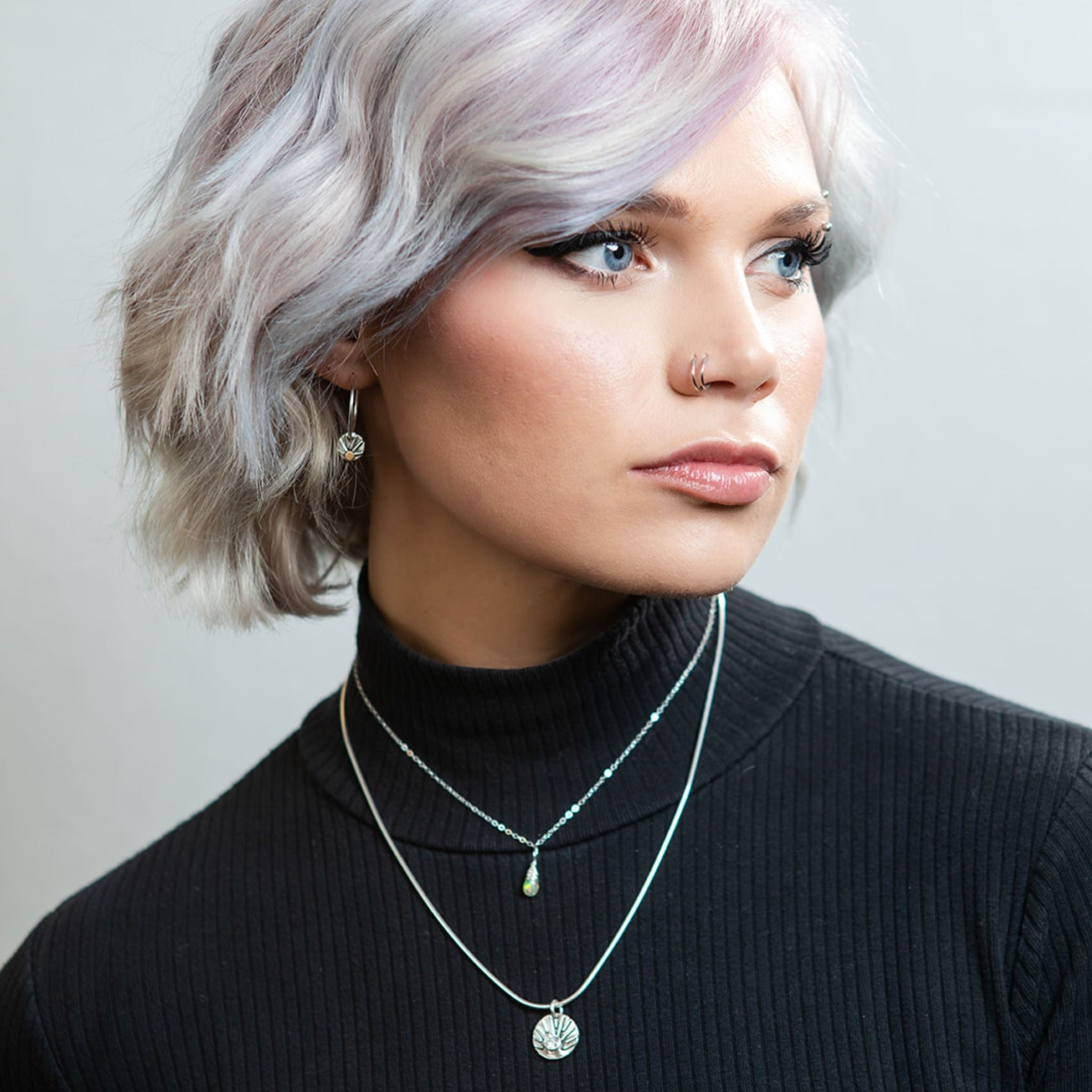 Model wearing moissanite necklace