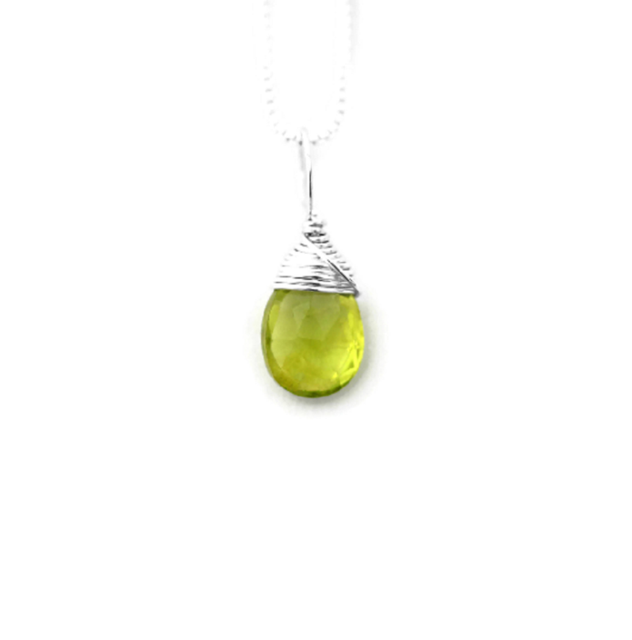 August birthstone necklace in silver, closeup