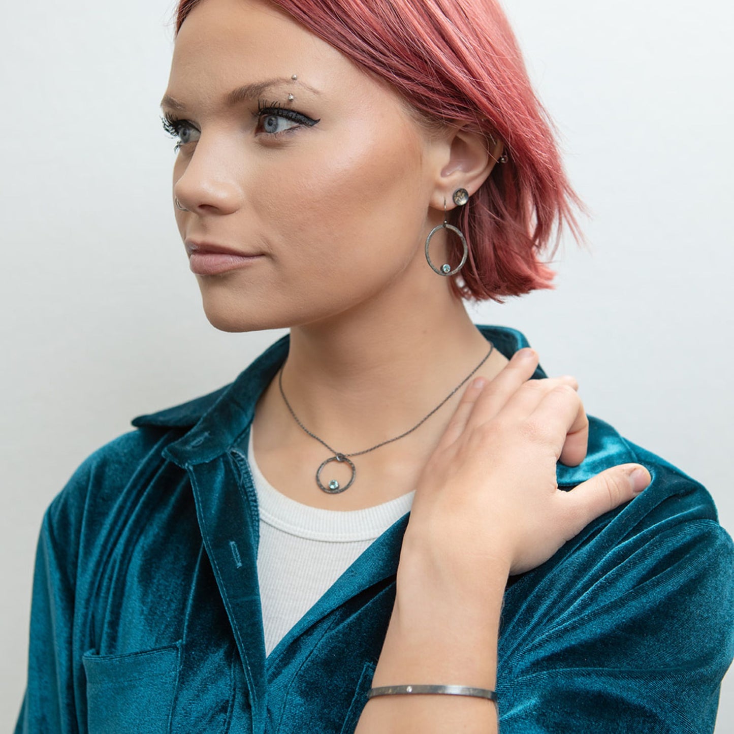 Galaxy gemstone hoop necklace on model