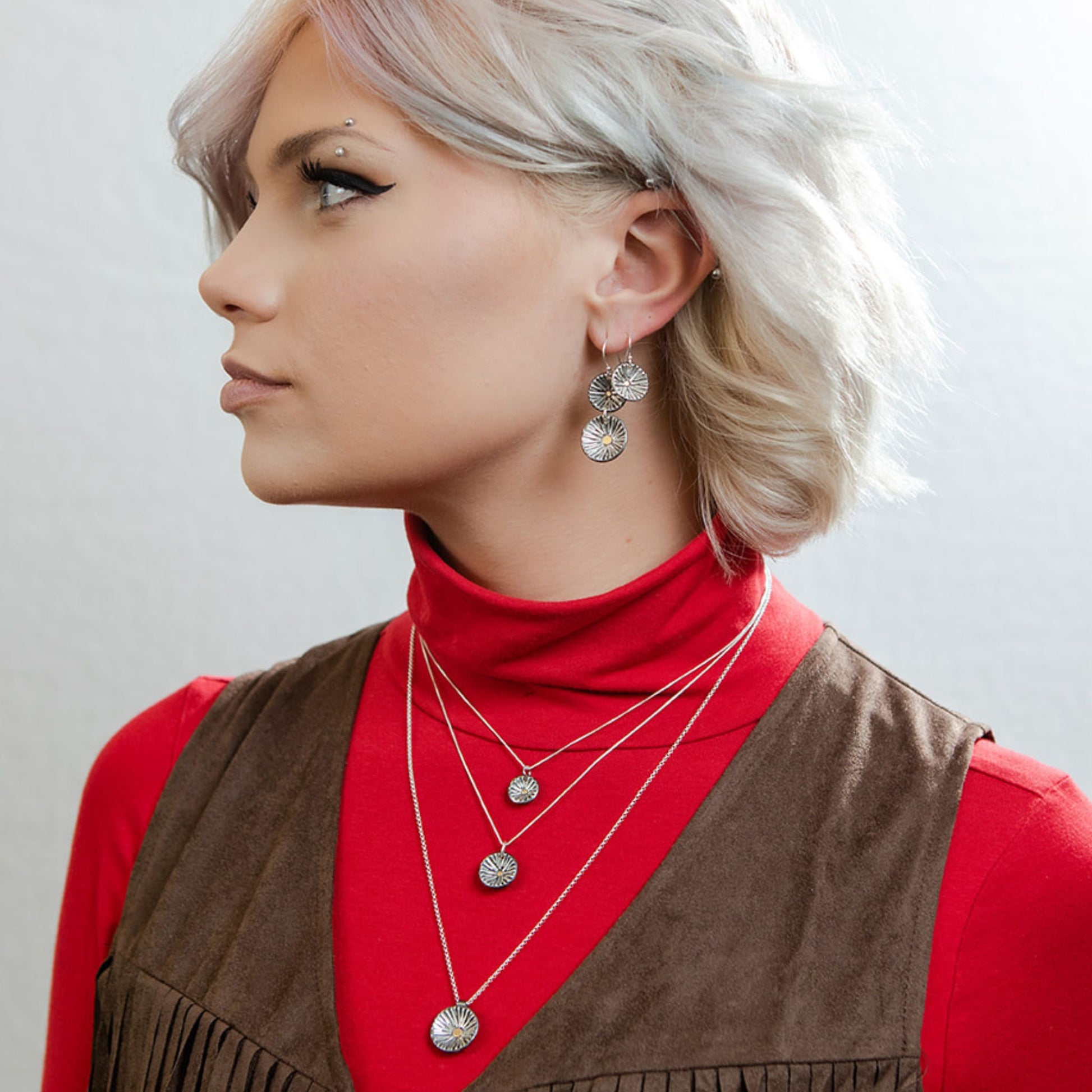 Model wearing radiance earrings