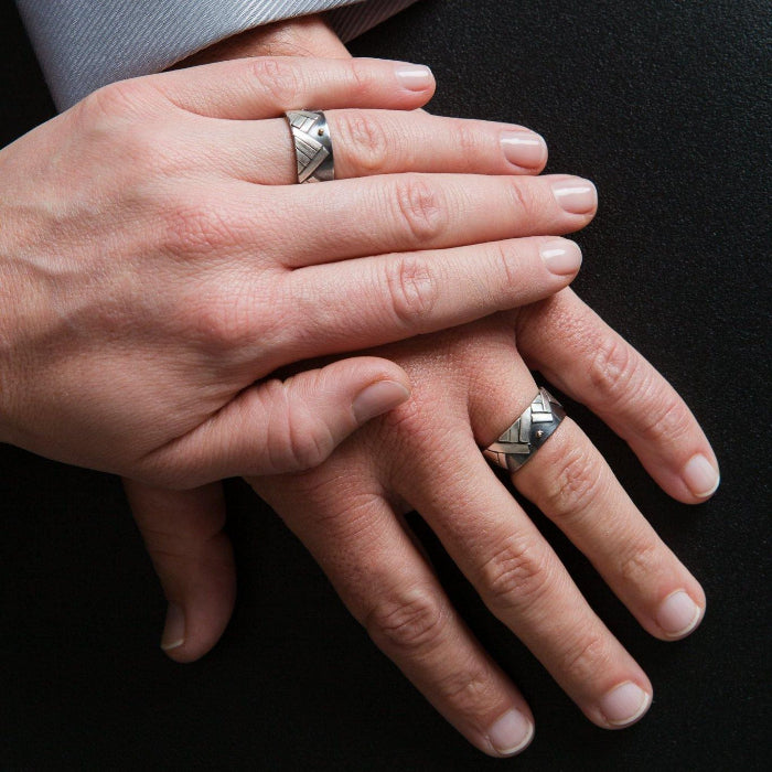 Silver and gold mountain rings on models